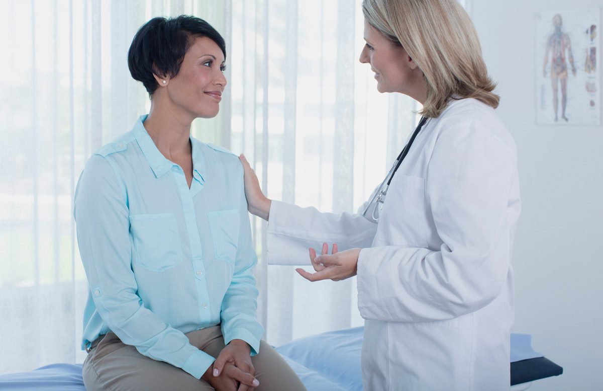 Doctor-speaking-to-patient-about-hormone-therapy